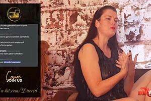 Teasering the viewer with BDSM, a sexy brunette mistress