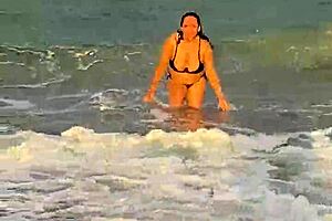 MILF from Brazil shows off her enormous tits and naked blowjob at Miami beach