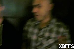 The act of passionate kissing and fingerling by a young couple exploring outdoor sex