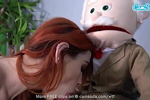 Redhead babe thrusts hips and becomes a puppeteer in sauna cam scene