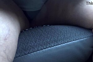 Mammoth wife shows it off in car