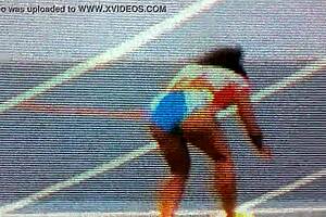 African Black girl who appears to be unusually dark skinned is seen wearing a mini-skirt that was up skirted on a hidden video camera