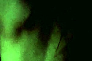 In the dark, a petite Latina teen moans loudly while getting slapped during intense doggystyle sex with a hardcore pornstar prostitute.