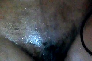 Ebony milf fingers her black pussy hard