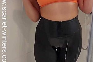 Hey, that hot brunette babe teases in her sports bra and leggings under the shower spray