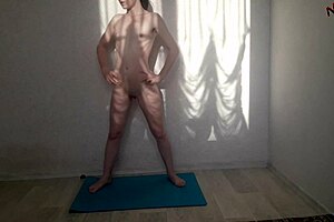 sexy girl doing nude yoga solo at home. watch her stretch naked.
