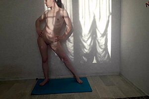 sexy girl doing nude yoga solo at home. watch her stretch naked.
