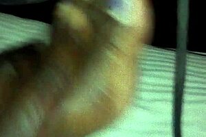 Ebony milf fingers her black pussy hard