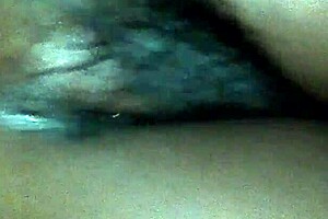 Ebony milf fingers her black pussy hard