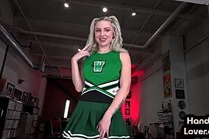 redhead cheerleader babe strokes pov cock with small tits and tattoos