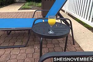 Tiny Ebony Babe Undresses Soaked Bikini