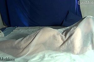 Silly Latina Strips Naked Under Sheets