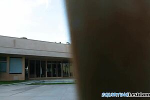 The milf lesbian couple engages in sensual kissing before she squirts passionately.