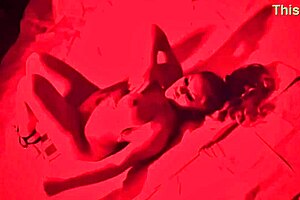 ms red x tempts with her glazed strip tease, revealing shaved body and exotic curves