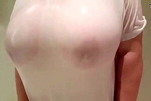 Sheila's big tits soak in the shower