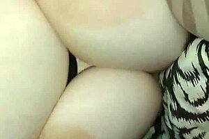 Man fucks his wife while camera focuses on her 42F natural tits.