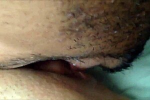 Intriguing close-up of couple licking shaved teen pussy at home