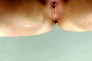 horny milf fingers her shaved pussy to orgasm