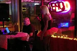 Blonde transsexual attends party gathering