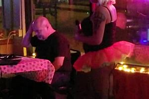 Blonde transsexual attends party gathering