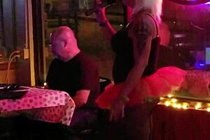 Blonde transsexual attends party gathering