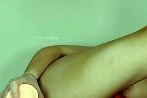 horny milf fingers her shaved pussy to orgasm