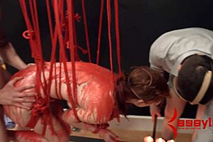 Redhead Babe Endures Intense Wax Bondage Ecstasy