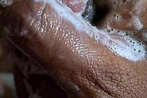 An Indian gay guy man masturbates while licking and sucking cock