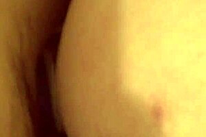 Exploring intimate moments with a brunette in a private setting