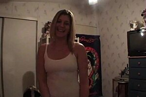 A perfect blonde amateur teases with medium tits before delivering a blowjob.