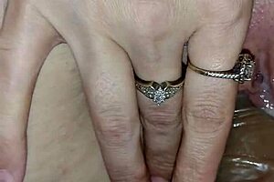 my gf feels deep emotions while using big dildo on herself, her friend watches intently.