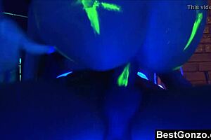 blacklight rough fuck contrasts audrey bitoni's big tits and monster cock