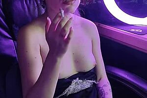 Hey, check out this cute asian lady lighting up a cigarette in a sexy way