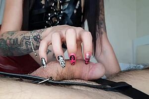 nail fetish dominatrix nika scratches slave's big dick.