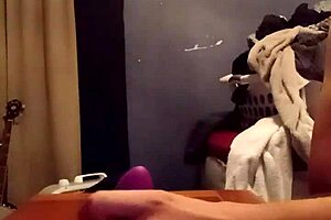 She tries stretching with a buttplug insertion