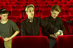 Cinema hall threesome features 2 tops dominating 1 bottom 😈