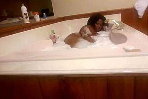 Marliese Morgan, sexy ebony BBW, lathers up big tits and ass!