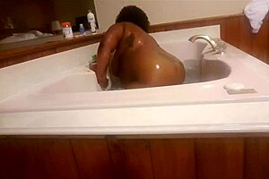 Marliese Morgan, sexy ebony BBW, lathers up big tits and ass!