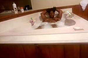 Marliese Morgan, sexy ebony BBW, lathers up big tits and ass!