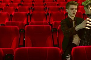 Cinema hall threesome features 2 tops dominating 1 bottom 😈