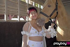 Latina muse Mia Valentine strips to reveal her big natural tits