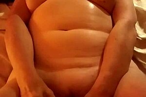 Husband uses rabbit toy to bury it deep for intense orgasm.