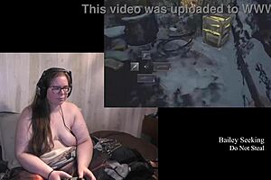 The brunette bbw plays Resident Evil naked on the ranch