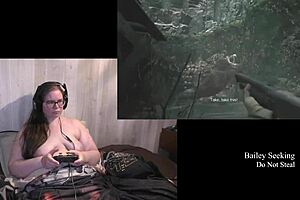 The brunette bbw plays Resident Evil naked on the ranch