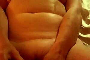 Husband uses rabbit toy to bury it deep for intense orgasm.