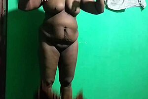 Oh man, this Indian horny milf is using that umbrella in the wildest way, you won't believe it!