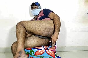 Inserting brush into ass with handjob