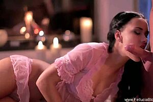 Beautiful brunette gives handjob and blowjob by fireside, swallowing cumshot