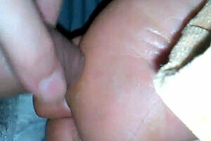 Rubbing uncut cock on mature soles for cum