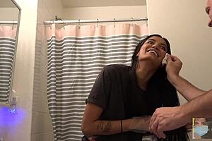 Beautiful Woman Dyes Hair Black in Mirror